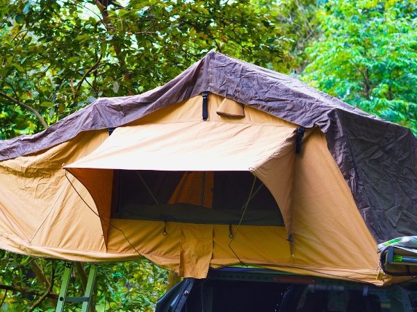 Rooftop tent camping setup on 4x4 safari vehicle for Kenya camping safari adventure